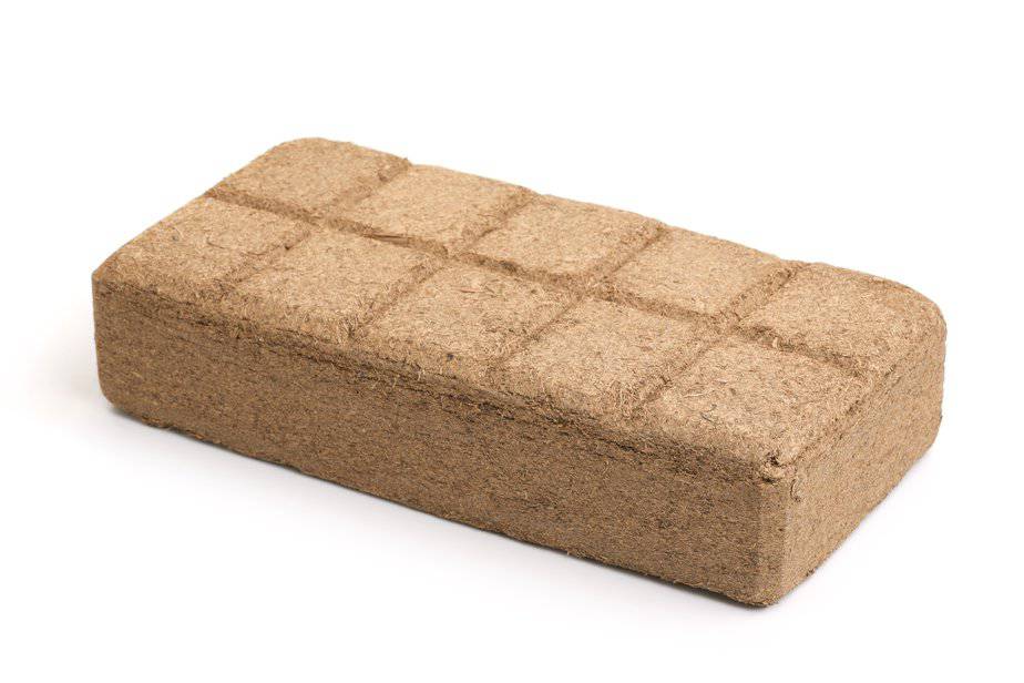 coco peat or pith pressed into dense blocks or bricks before being broken up and added to soil as an amendment